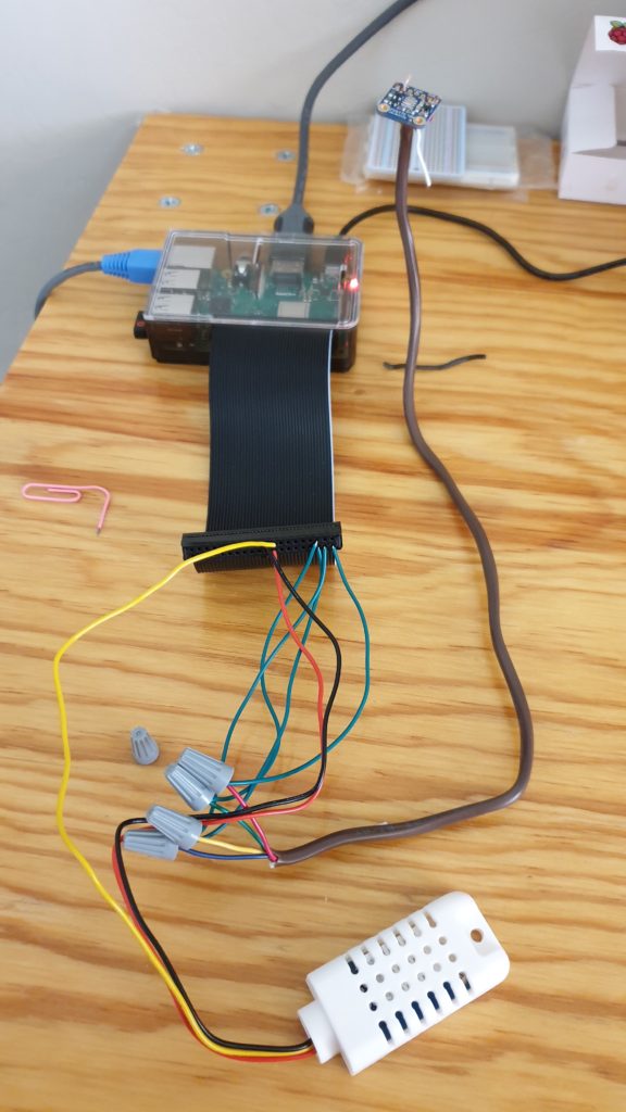 DIY weather station sensors connected to the GPIO ribbon with jumper wires