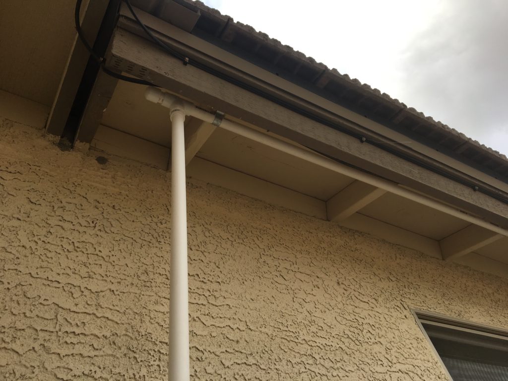 Plumbing for the anti-woodpecker system underneath the eaves