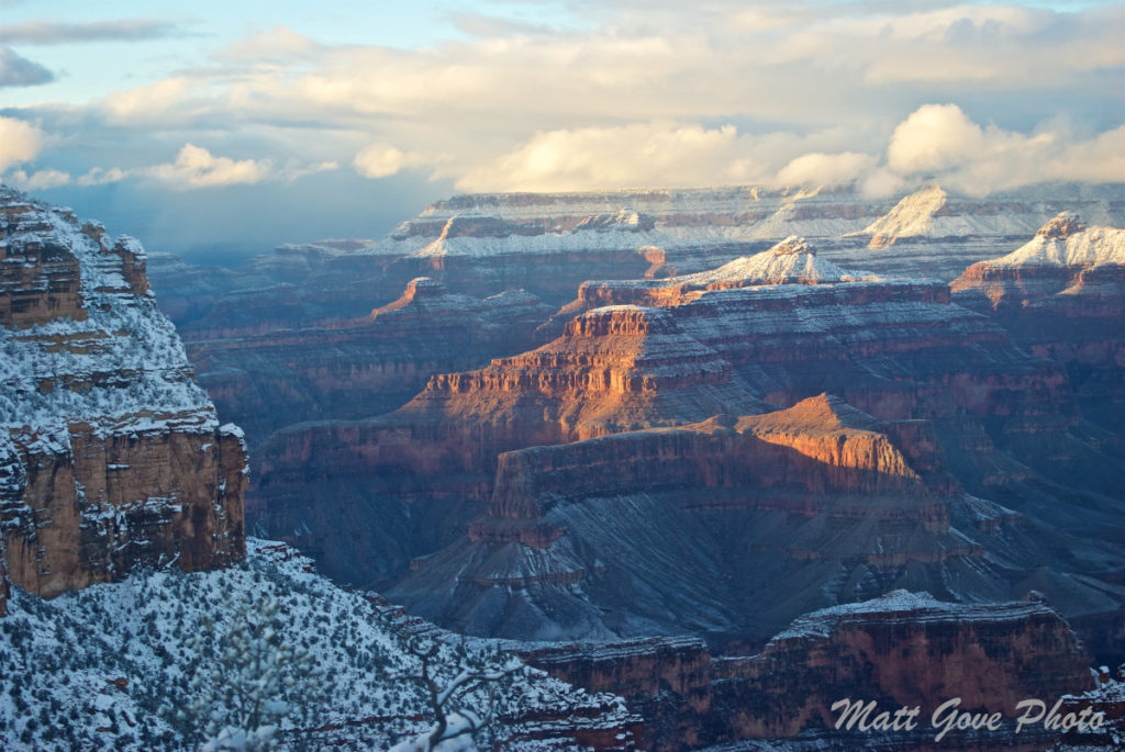 Soft evening light illuminates the Grand Canyon after a snow storm