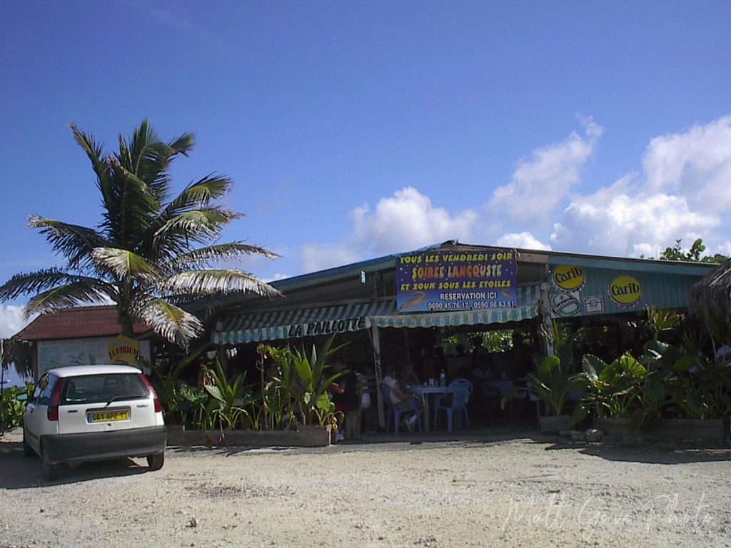 Restaurant with a sign advertising zouk music in Guadeloupe