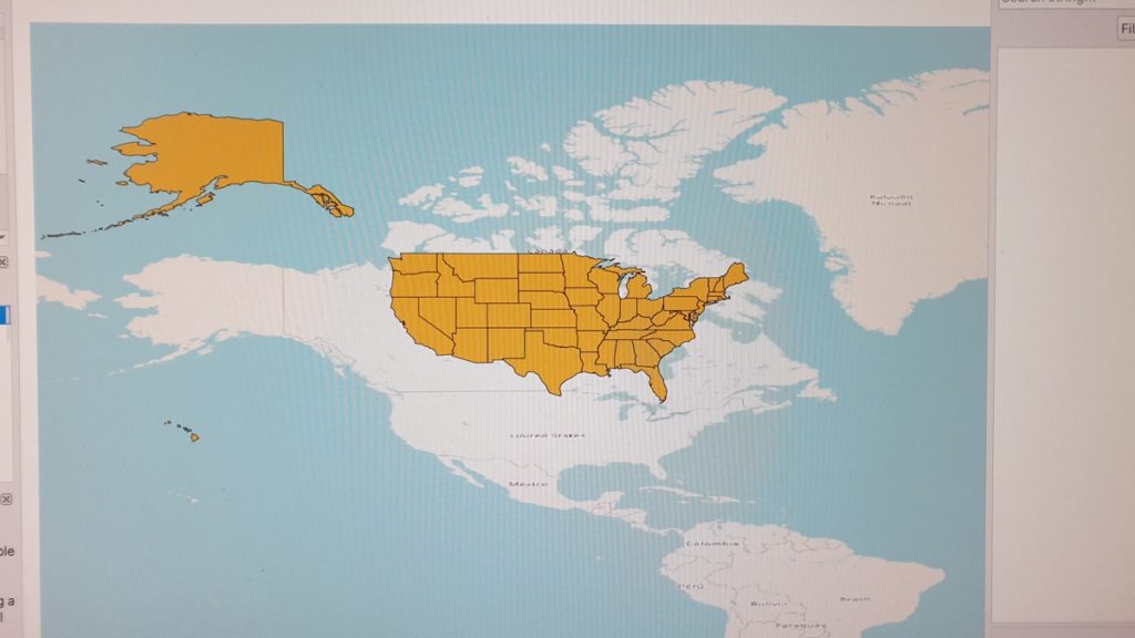 The outline of US States lies projected over Canada when the basemap is in a different projection from the shapefile.