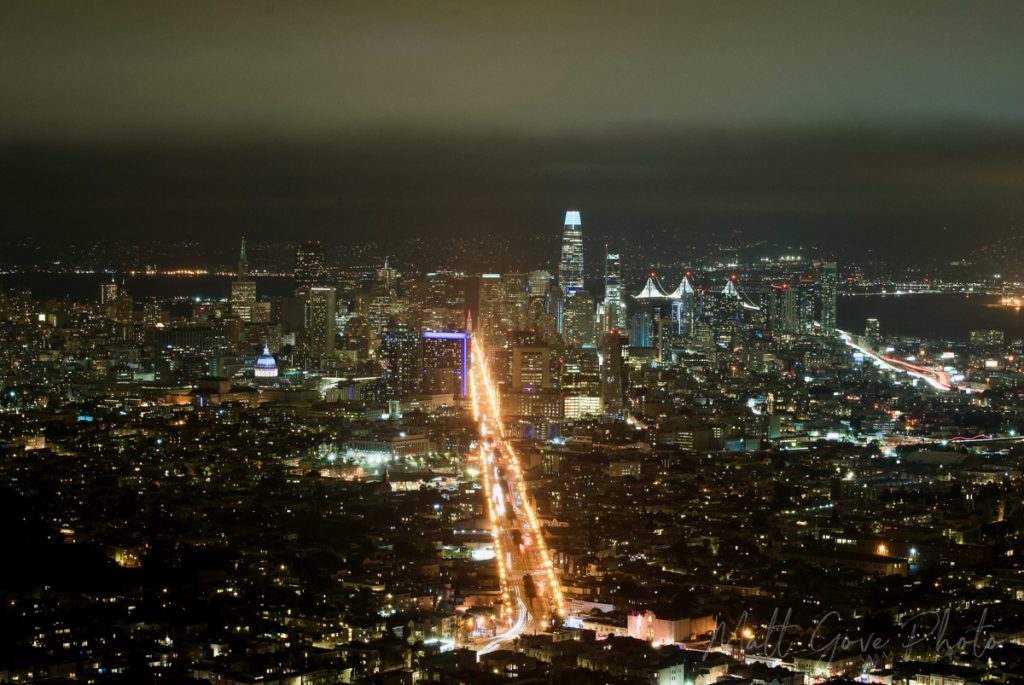 The San Francisco skyline glistens on a clear night.