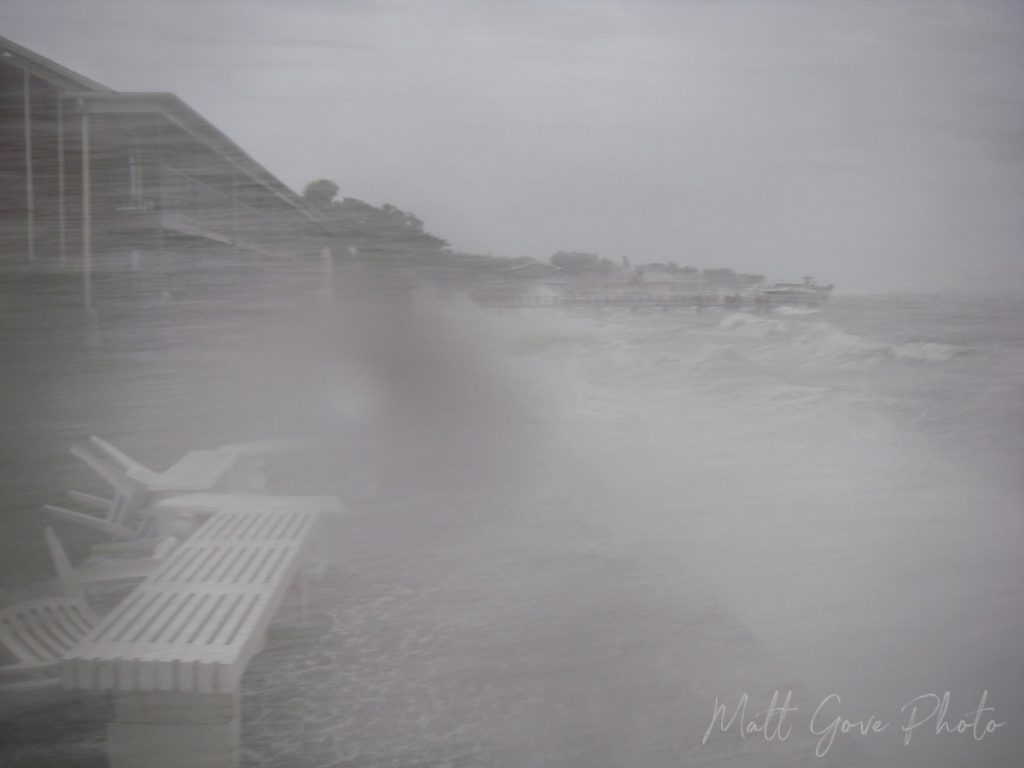 Hurricane conditions drive rain and seawater horizontally as a powerful cold front slams St. Petersburg, Florida