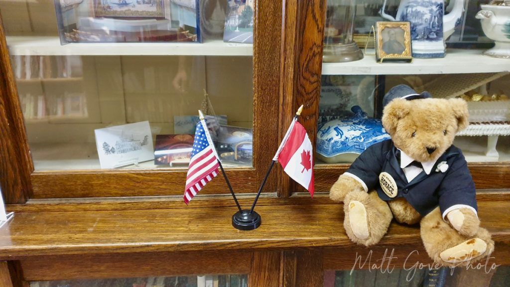 Flags mark the international border inside the Haskell Free Library and Opera House