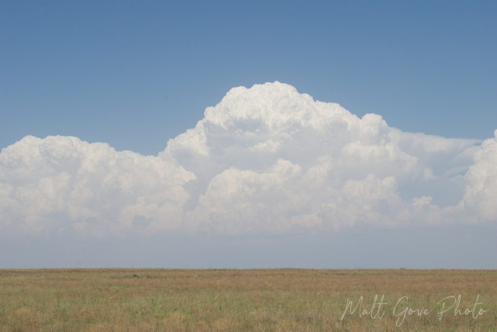 Developing supercells are a striking weather feature on a landscape that would otherwise make boring photography